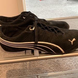 Black Puma sneakers